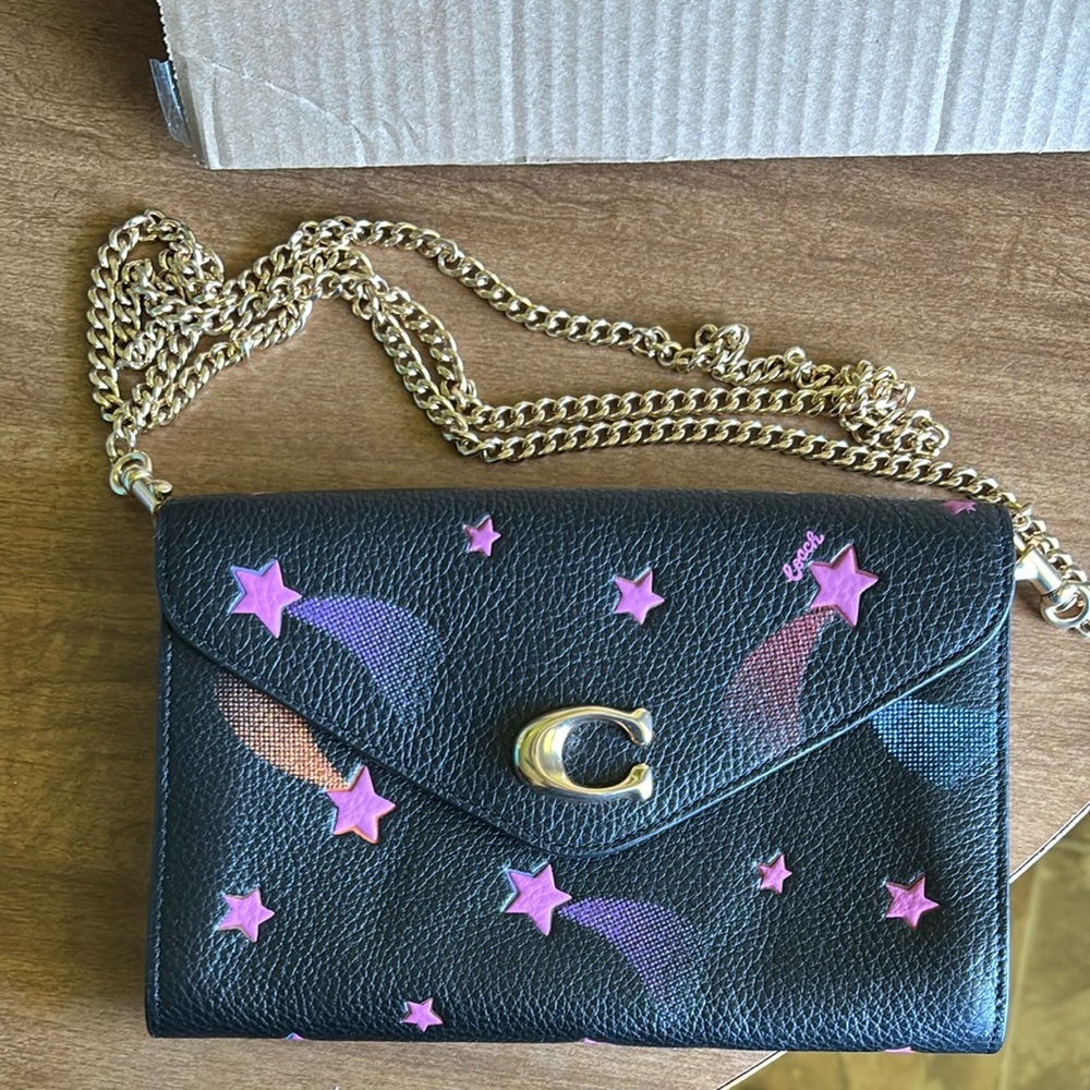 Coach Black and Pink Star Clutch with Gold Accents